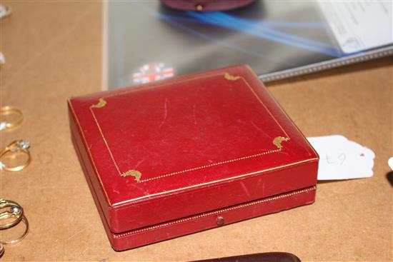 A George VI Cartier silver and yellow metal mounted cigarette case, in original fitted Cartier gilt tooled leather box.